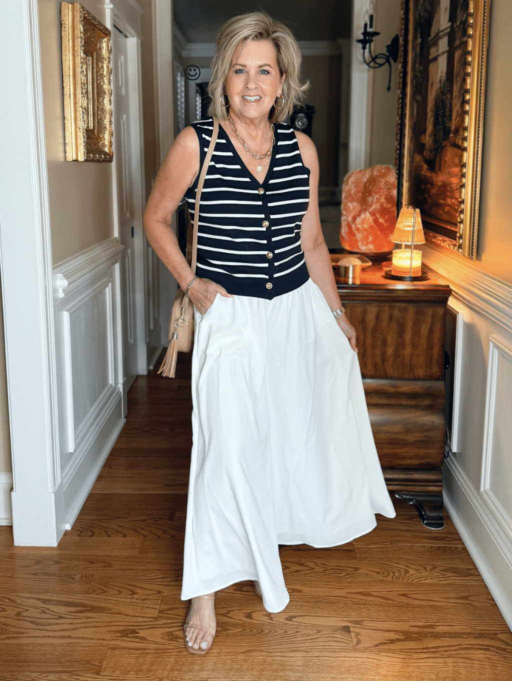 Tania Stephens is wearing a striped vest with white palazzo pants from Amazon